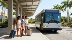 Travelers with luggage at Miami Airport Terminal E walking toward the car rental shuttle