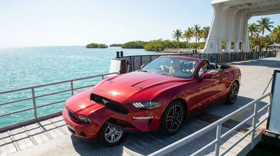 White car rental parked on a ferry deck crossing bright blue water in the Florida Keys