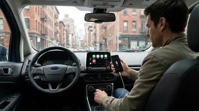 Dashboard screen displaying Android Auto in a New York car rental with city streets visible through the windshield