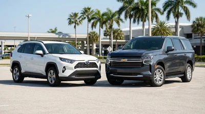 A modern SUV parked on a sunny coastal road with palm trees during a Florida car hire