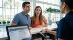 Customer inserting a credit card into a payment terminal at an Orlando car hire desk