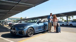 Row of vehicles parked at a car rental lot outside the LAX airport in Los Angeles