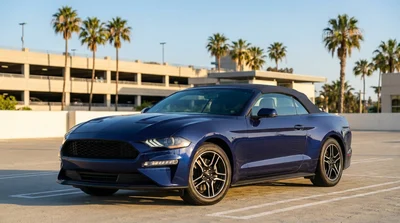 Modern car rental driving along a scenic coastal highway in California