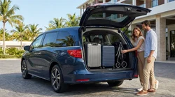 Family loading two suitcases and a buggy into the trunk of a car rental on a sunny street in Miami