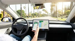 Dashboard screen displaying wireless Apple CarPlay inside a Los Angeles car rental