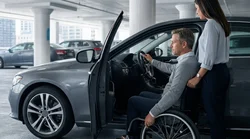 Driver using hand controls inside a car rental vehicle on a New York street