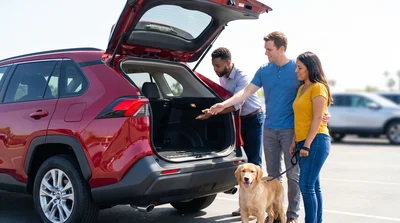 Travelers with dog discuss pet cleaning fees for a california rental car.